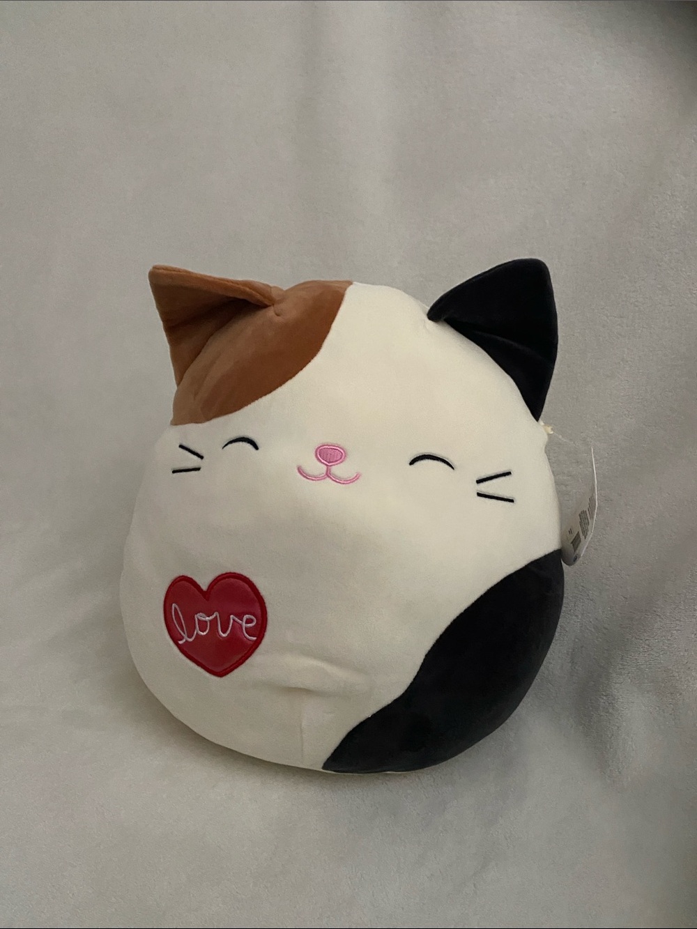 Squishmallows Calico Cat Plush - White, Black & Brown with Red Heart